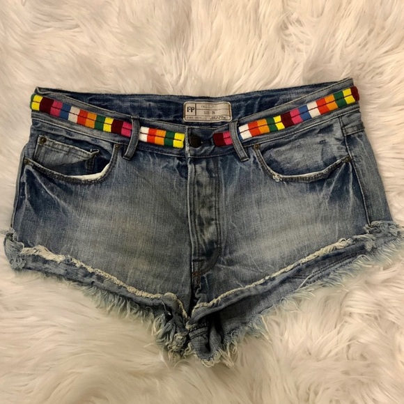 Free People distressed denim shorts with colorful stitch detailing - Picture 1 of 9